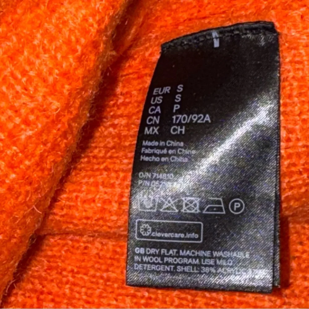 H&M Studio orange turtleneck sweater